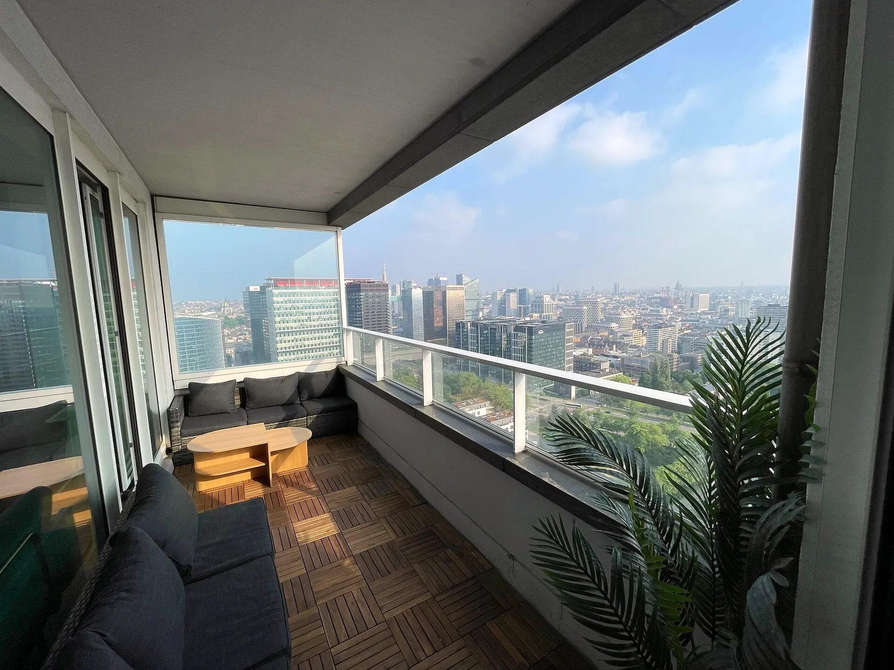Terrace with outdoor lounge and skyline view
