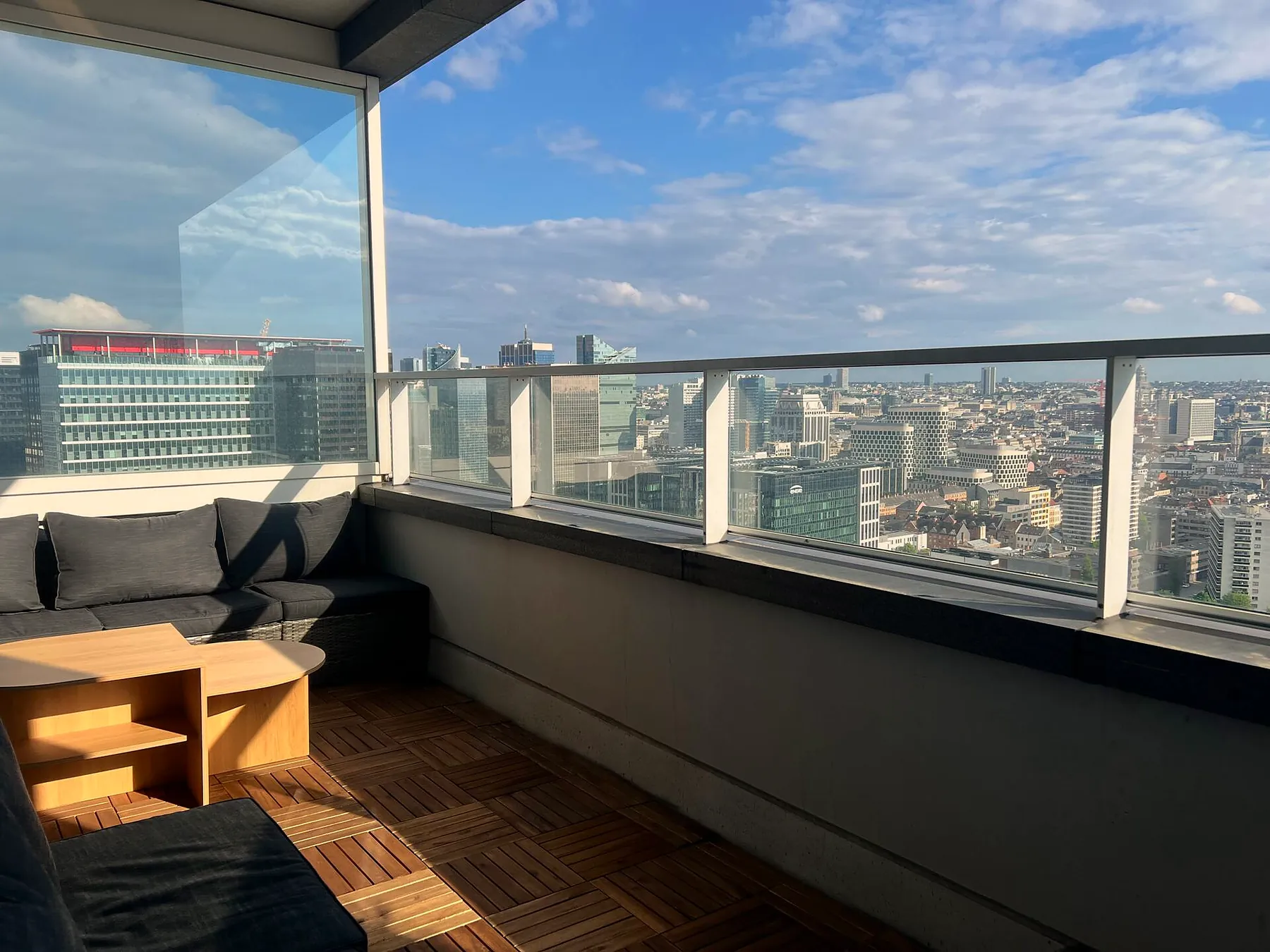 Terrace lounge seating above the city