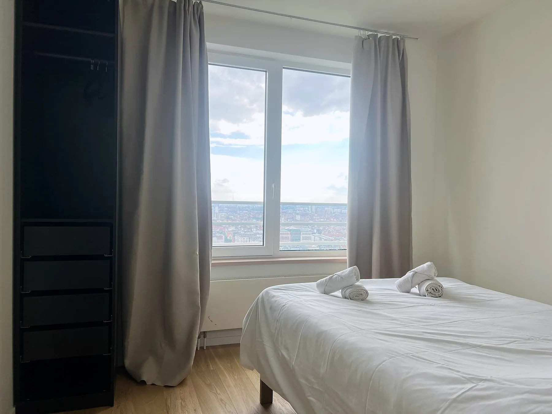 Bedroom with window and wardrobe