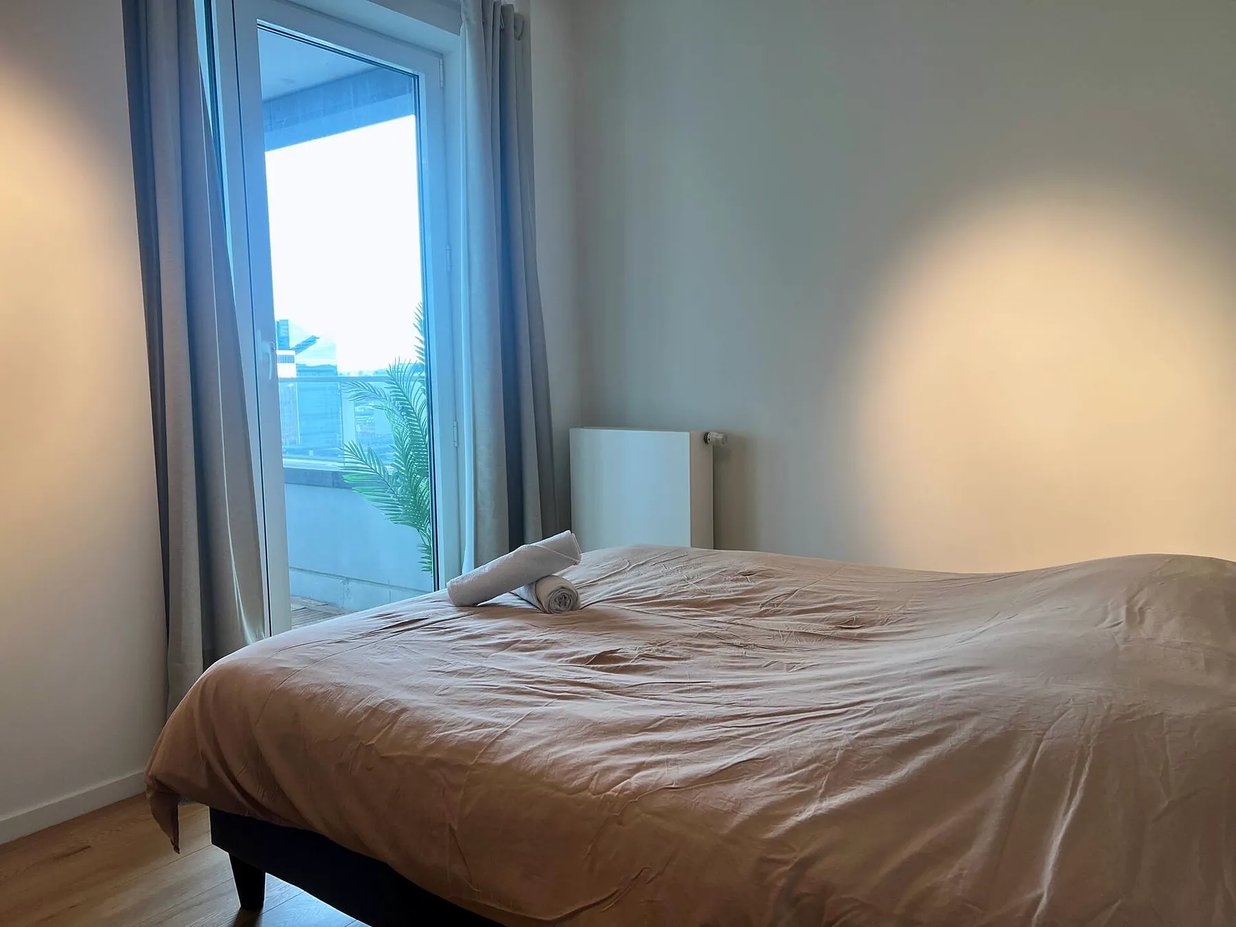 Bedroom with floor-length window