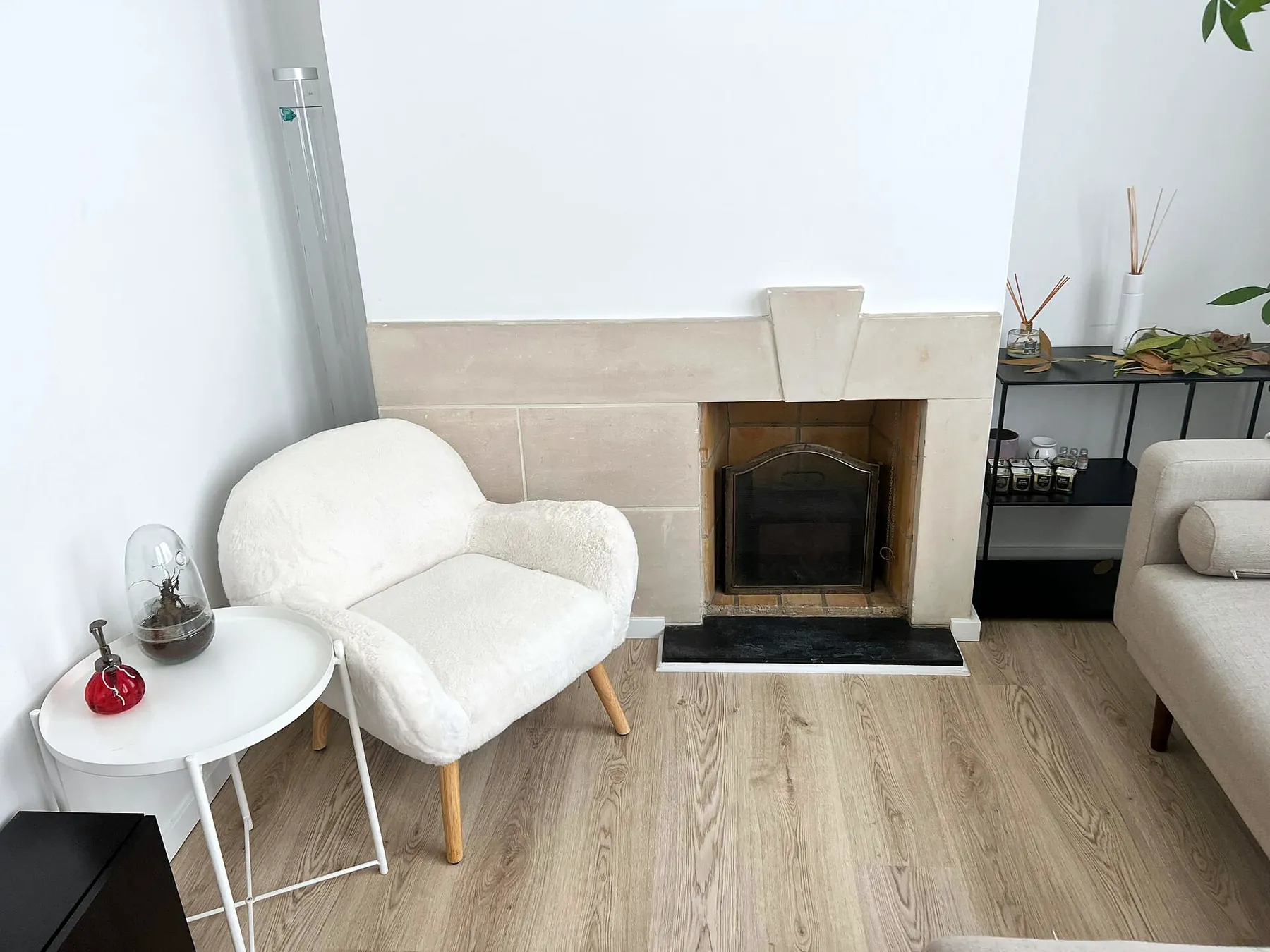 Armchair beside the fireplace