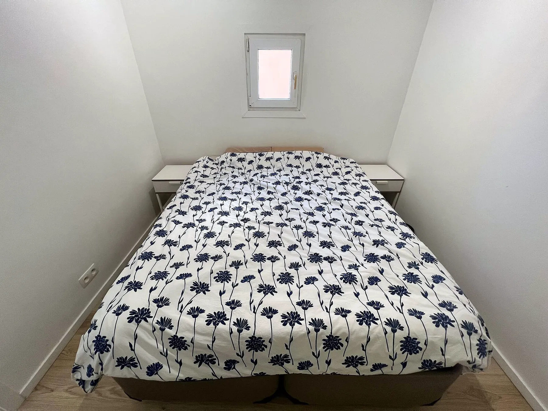 Queen bed with bedside tables